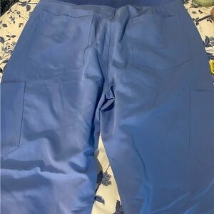 Mandela scrub paints in Cecil blue. Never worn. Medium petite.